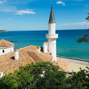 View of the historic Balchik Palace with a stunning coastal backdrop of the Black Sea in Bulgaria.