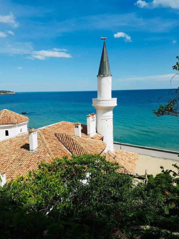 View of the historic Balchik Palace with a stunning coastal backdrop of the Black Sea in Bulgaria.